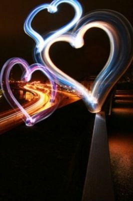 Trails de Lumière en Forme de Cœur
