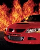 Voiture Mitsubishi Rouge dans les Flammes