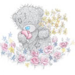 Ourson Mignon avec des Fleurs