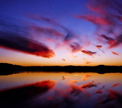 Reflet Éblouissant du Coucher de Soleil
